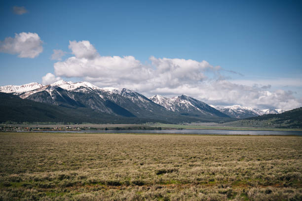 istock Scenic view of lush valley and Mountains 1412733308