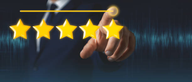 istock Businessman hand touches five stars rating feedback on virtual screen 1412734347