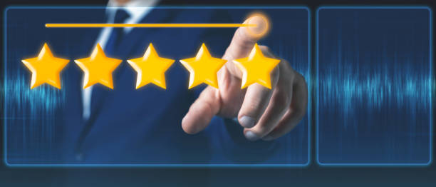 istock Businessman hand touches five stars rating feedback on virtual screen 1412734348