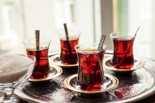 istock Cup of turkish tea served in traditional style 1412734398