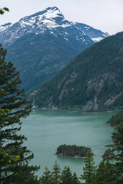 istock Scenic view of lake and Mountains 1412734416