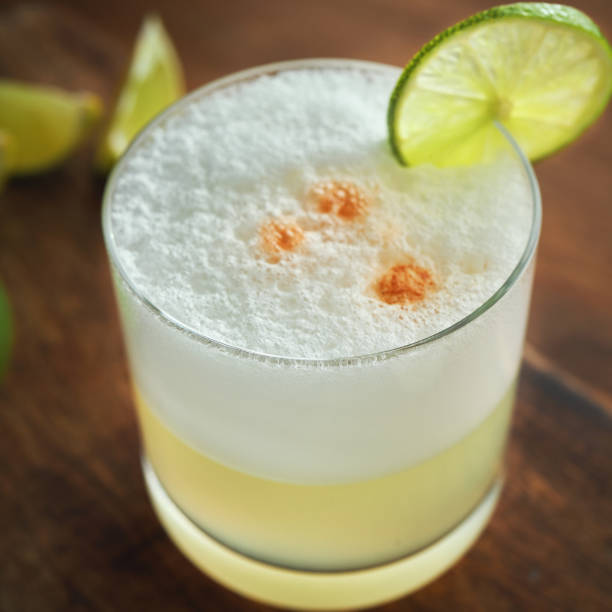 istock Pisco Sour Cocktail served with Lime 1412734537
