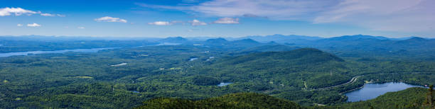 panoramic view of the eastern townships from the summit of Mont Orford in summer panoramic view of the eastern townships from the summit of Mont Orford in summer lake magog photos stock pictures, royalty-free photos & images