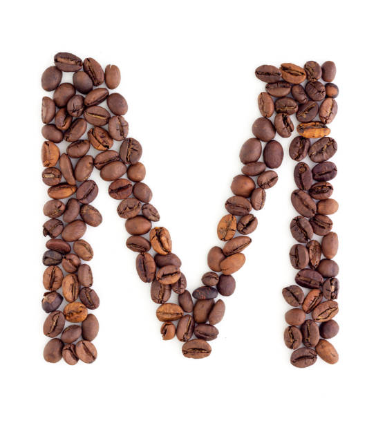 Coffee spelling word made of coffee beans