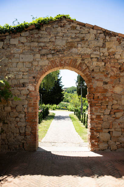 istock brickstone arch and passage in Fortunago, Italy. 1412738407