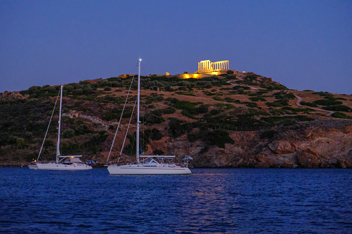 Cape Sounio in Athens, Athens, Greece with the ancient Temple of Poseidon during night at summer