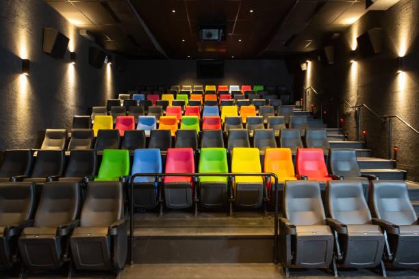 istock Cinema room with seats in various colors 1412740024