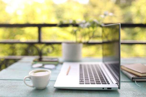 istock laptop side view and coffee cup relax workplace 1412740397