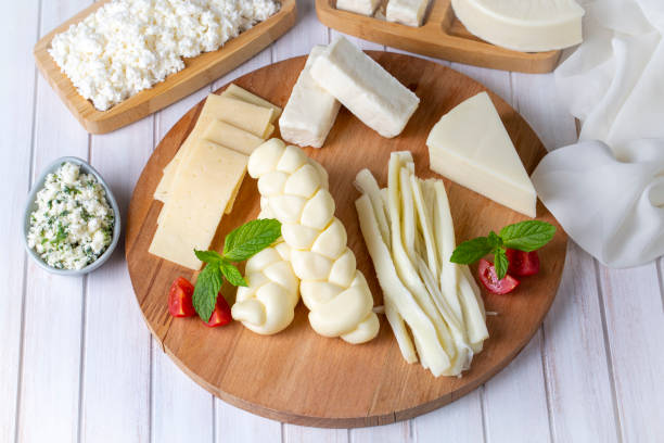 istock Traditional various cheeses, string, knitted and cecil cheese, turkish delicatessen concept 1412741002