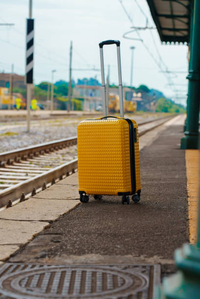 istock Forgotten travel bag on the train station. 1412742937