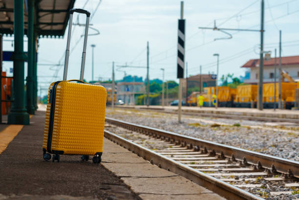 istock Forgotten travel bag on the train station. 1412742995