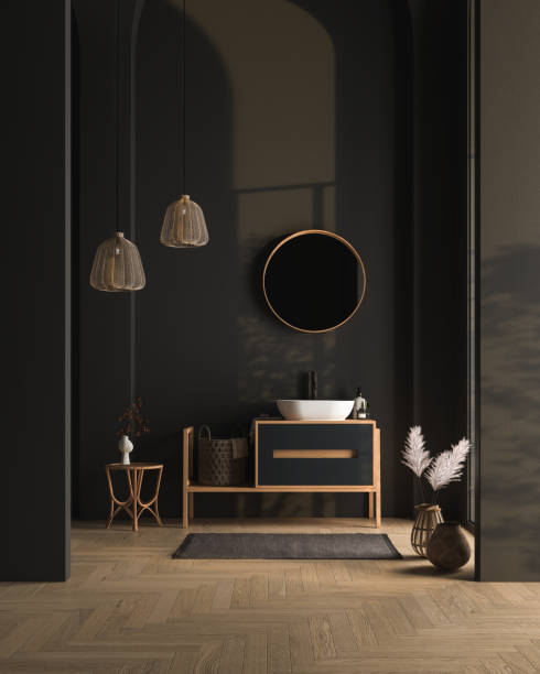 Interior of minimal dark bathroom with black walls, wooden floor, dry plants, arches, stock photo