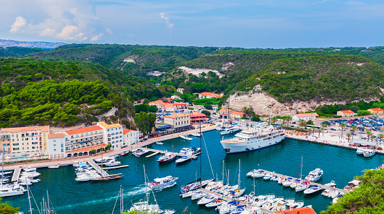 Bonifacio bay, Corsica. Aerial port view with sailing and motor boats