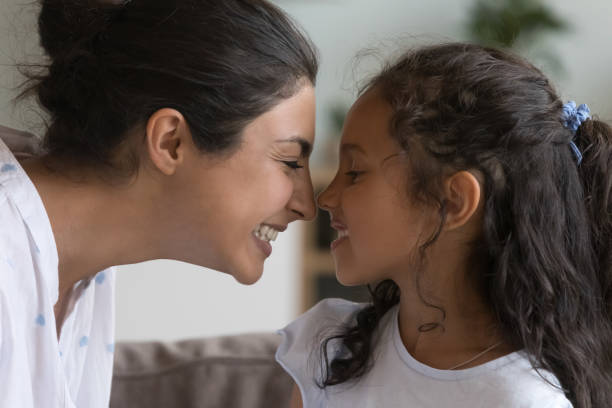 istock Happy loving Indian mom and daughter kid hugging with affection 1412746837