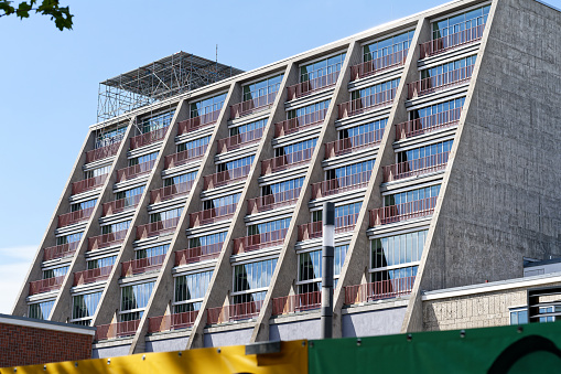 low angle view on facade of apartment house from the public housing program of east german period in Berlin Leipziger Strasse
