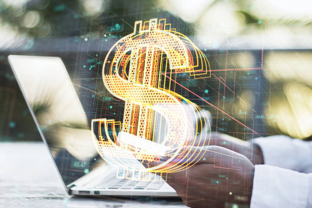 istock Creative glowing golden tech dollar icon hologram on blurry background. Crypto currency and technology concept. Double exposure. 1412748786
