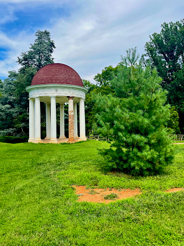 Montpelier Station, Virginia, USA - July 30, 2022: “ Madison’s Temple” located on the grounds of “James Madison’s Montpelier”, home of Founding Father and United States President James Madison and his wife Dolley Madison, is also used as the landmark’s symbol for marketing.