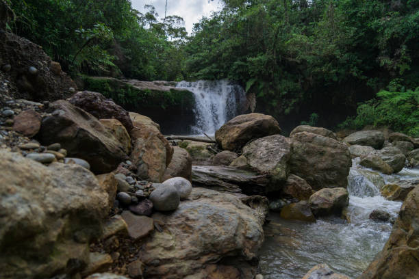 istock Beautiful waterfalls in a peaceful landscape 1412750814