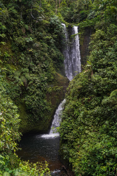 istock Beautiful waterfalls in a peaceful landscape 1412752894
