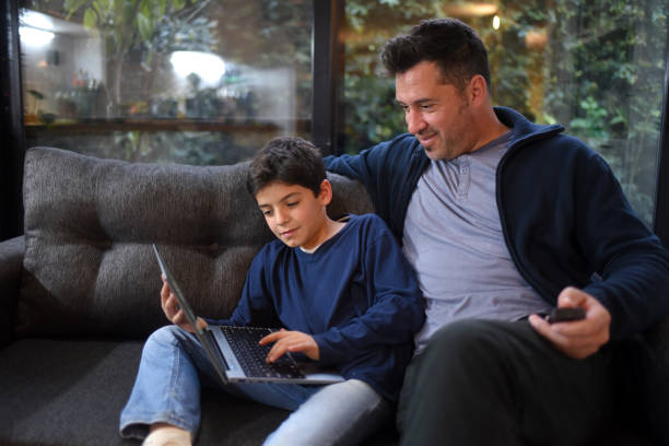 istock family enjoying technology 1412756019