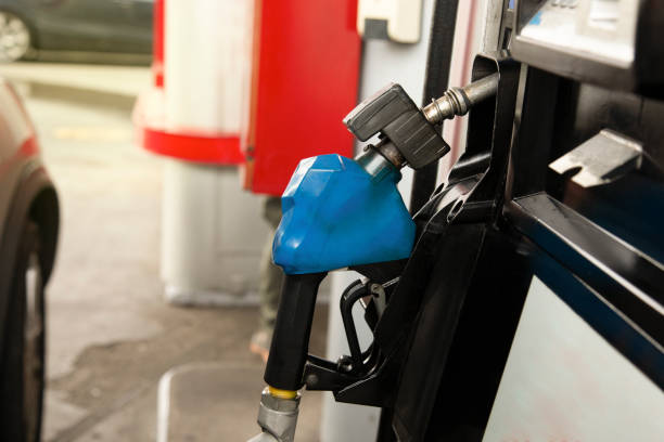 istock Gasoline pump, gasoline dispenser. Energy concept 1412759127
