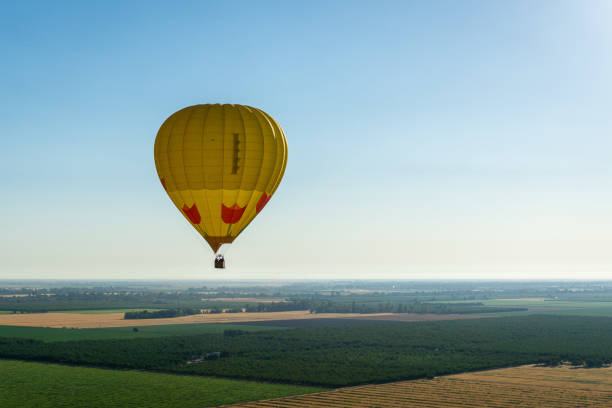istock Hot Air Balloon Above Horizon 1412760210