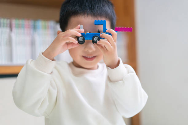 A Chinese baby playing with blocks