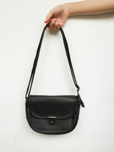 istock elegant and beautiful black leather handbag 1412760795