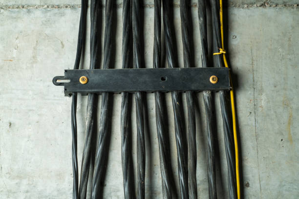 istock switching electrical wires. connecting and laying power cables 1412764445