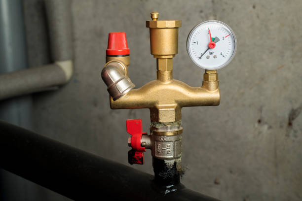 istock solid fuel boiler pipe fragments metal and plastic pump controller pressure gauge door lock iron pipes 1412764626