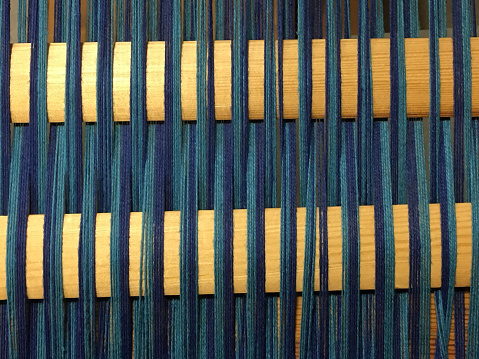 Threads in weaving loom
