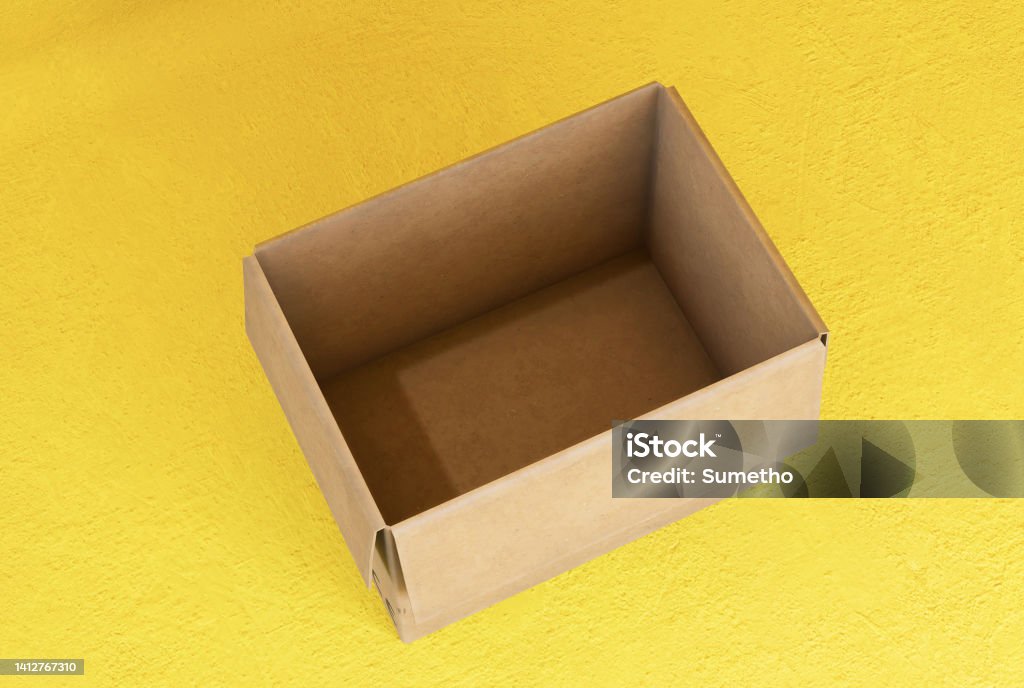 Empty Cardboad Box Empty Open Cardboard Boxes On Yellow Background Stock Photo - Download ...