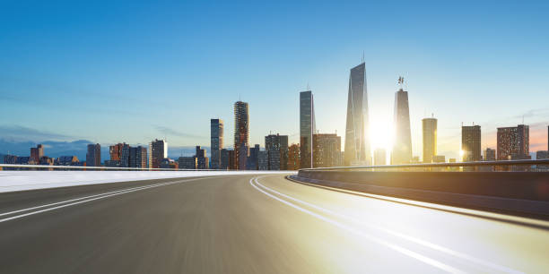 istock 3d rendering highway overpass motion blur with city 1412769926