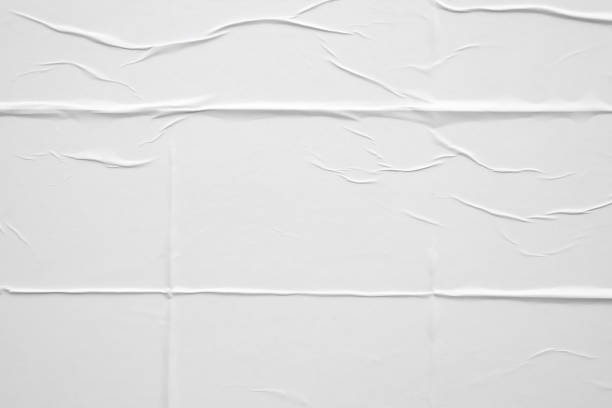 istock white crumpled and creased paper poster texture background 1412771316