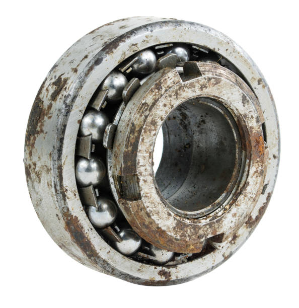 istock Bearing on a white background. Old worn bearing covered with rust 1412771400