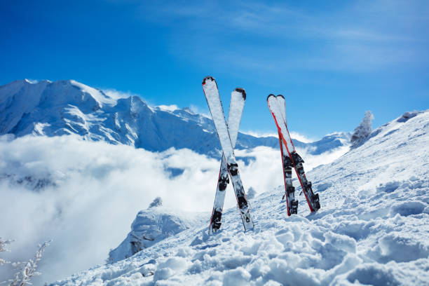 Snowboarder standing on the hill ready to ride