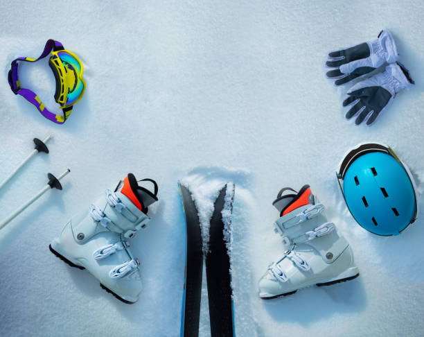 istock Group of objects ski boots, helmets, masks in the snow 1412772608