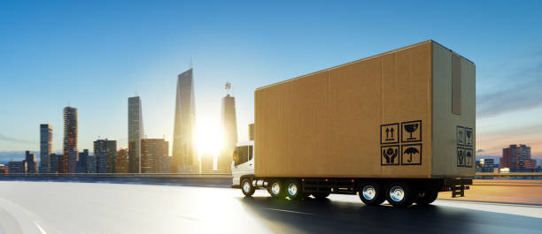 istock Cargo Truck with big cardboard box package on the road 1412772722