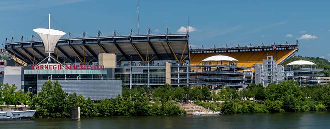 Pittsburgh, Pennsylvania, USA August 9, 2022 Heinz Field, home of the Pittsburgh Steelers, an NFL team next to the Carnegie Science Center on the north shore of the Ohio River on a sunny summer day