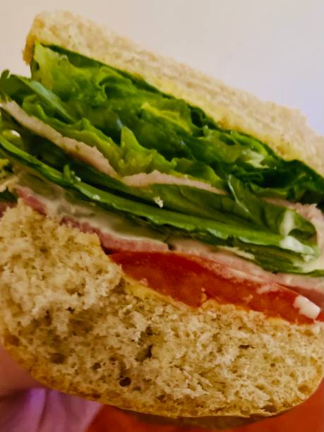 istock Fresh home grown garden vegetables in a sandwich 1412776355