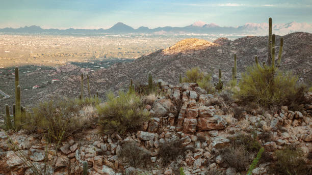Sunrise as seen from the east and Tucson in the valley among towering mountains on every side, a beautiful sight to behold in Arizona and a great place to live, as I call this home.