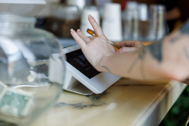 istock Mobile contactless payment with smartphone at the payment terminal. 1412780475