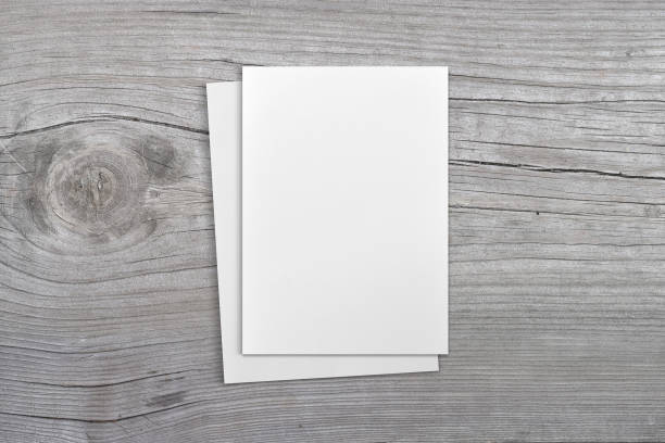 istock 5x7 Greeting Card Mockup on Wood Background with Clipping Path 1412781410