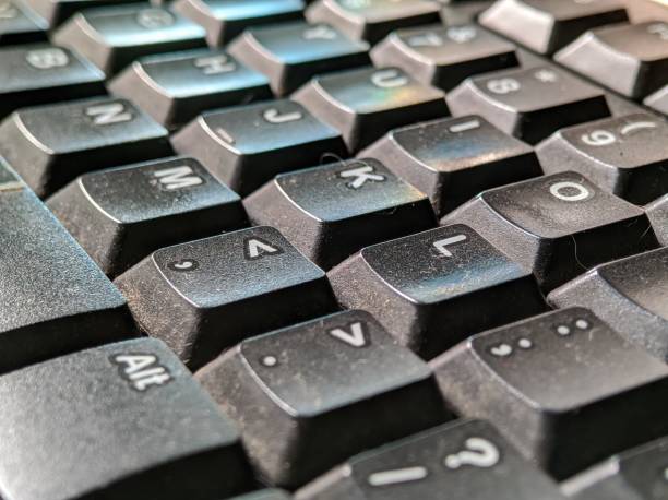 istock Dusty computer keyboard stock images 1412782057