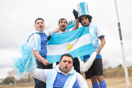 A group of mentally disabled argentine young people celebrating during soccer competition