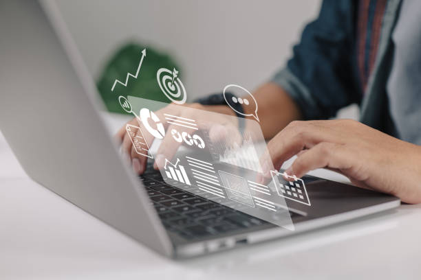 istock Laptop with graphs and charts on the screen, clipboard, report, target, calendar, magnifier. Financial Report. Accounting, analysis, audit, research, results. 1412784830