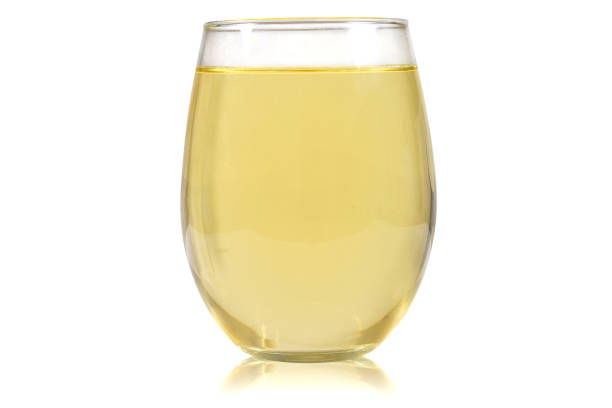 istock Stemless Wineglass Mockup with White Wine on White Background 1412786196