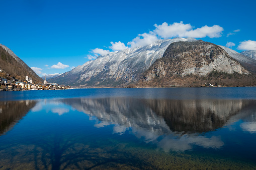 View of famous Hallstatt mountain village in the Austrian Alps at beautiful light during winter season, Austria