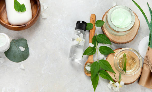 istock Aloe vera slices and moisturizer on a light background. 1412795826