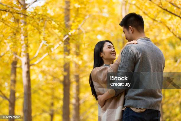 Couple Dancing With Affection In The Autumn Forest The Wife Draped In A Shawl Stock Photo Stock Photo - Download Image Now